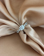Brilliant Cut Solitaire Ring with Infinity Twist Band