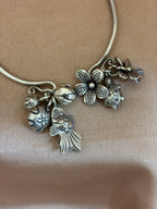 Open-Cuff with Flower and Charms