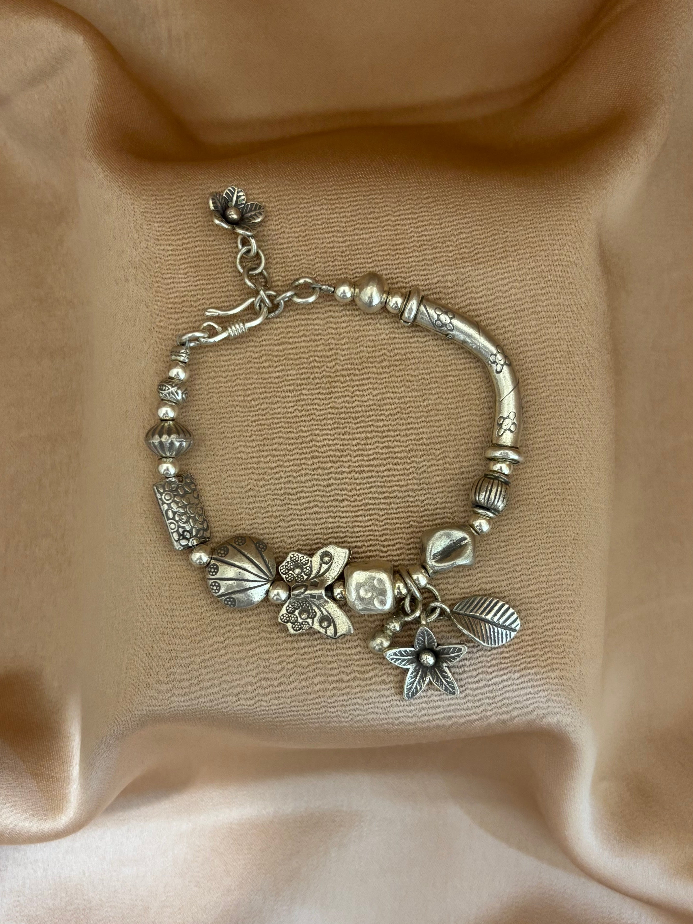 Artisan Silver Floral Charm Bracelet
