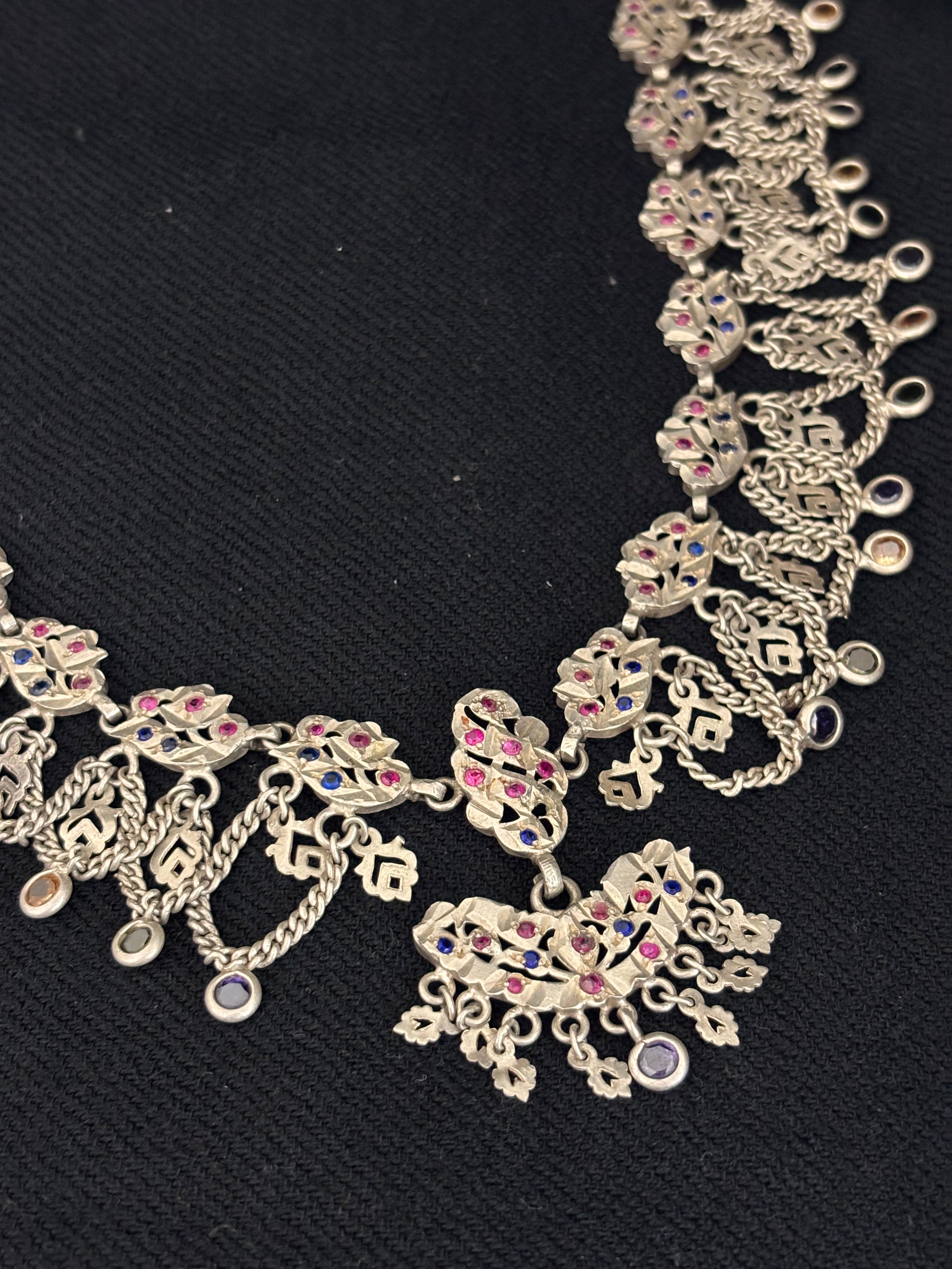 Intricate Silver Floral Necklace with Multicolored Accents