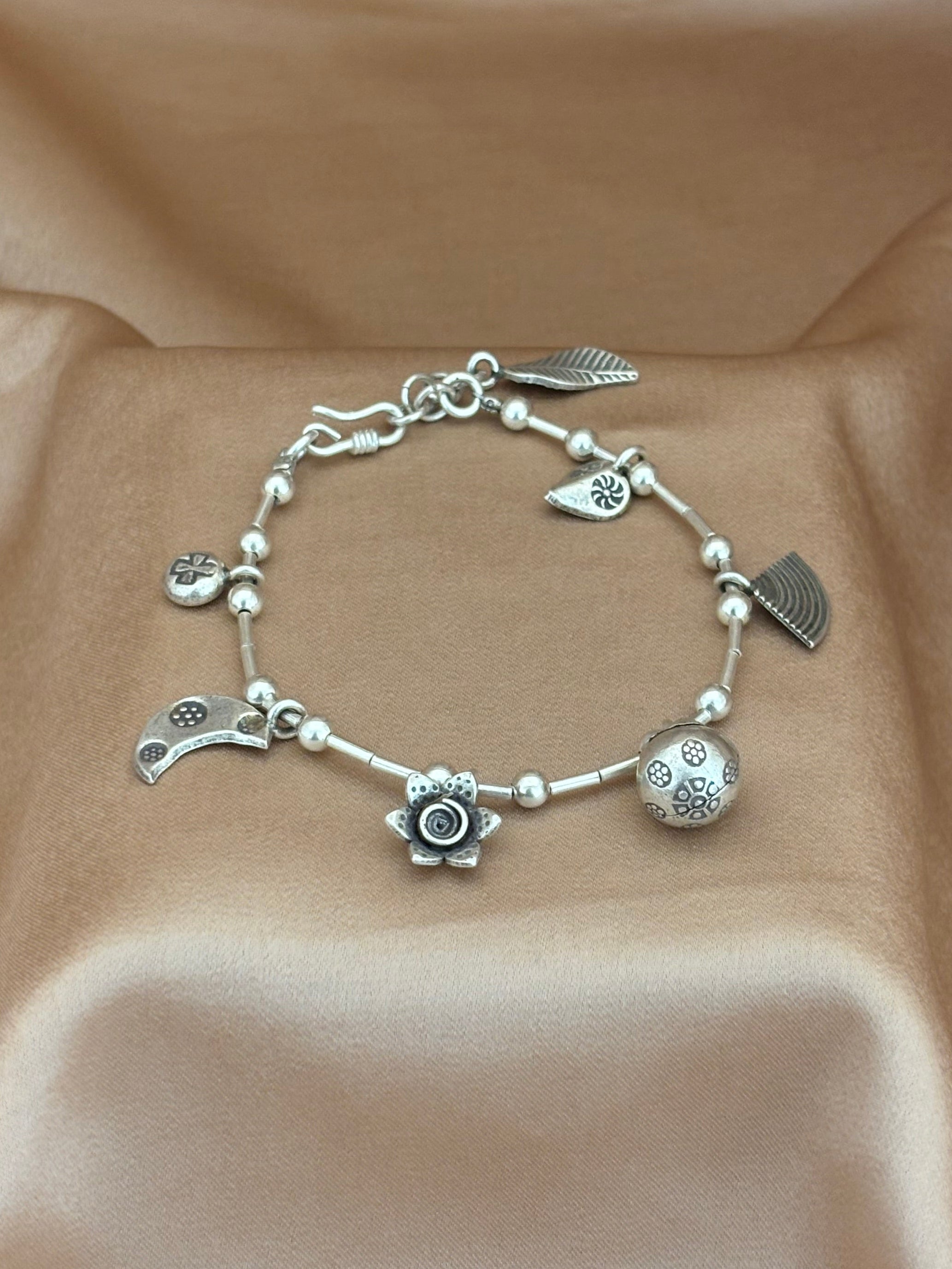 Whimsical Oxidized Silver Charm Bracelet