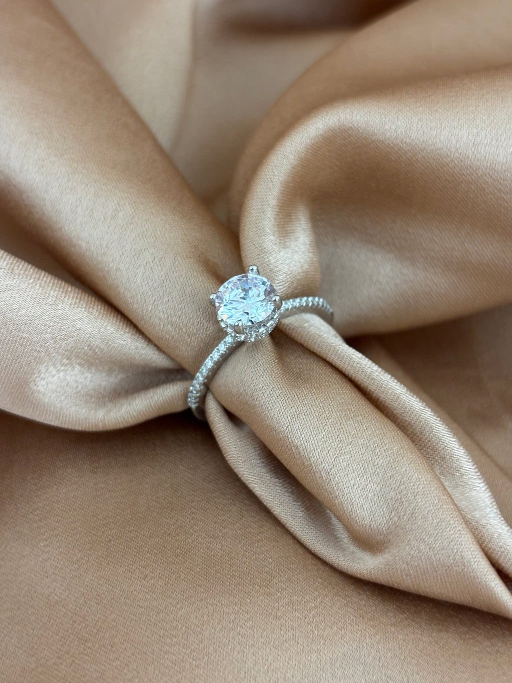 Classic Round-Cut Solitaire Ring with Hidden Halo