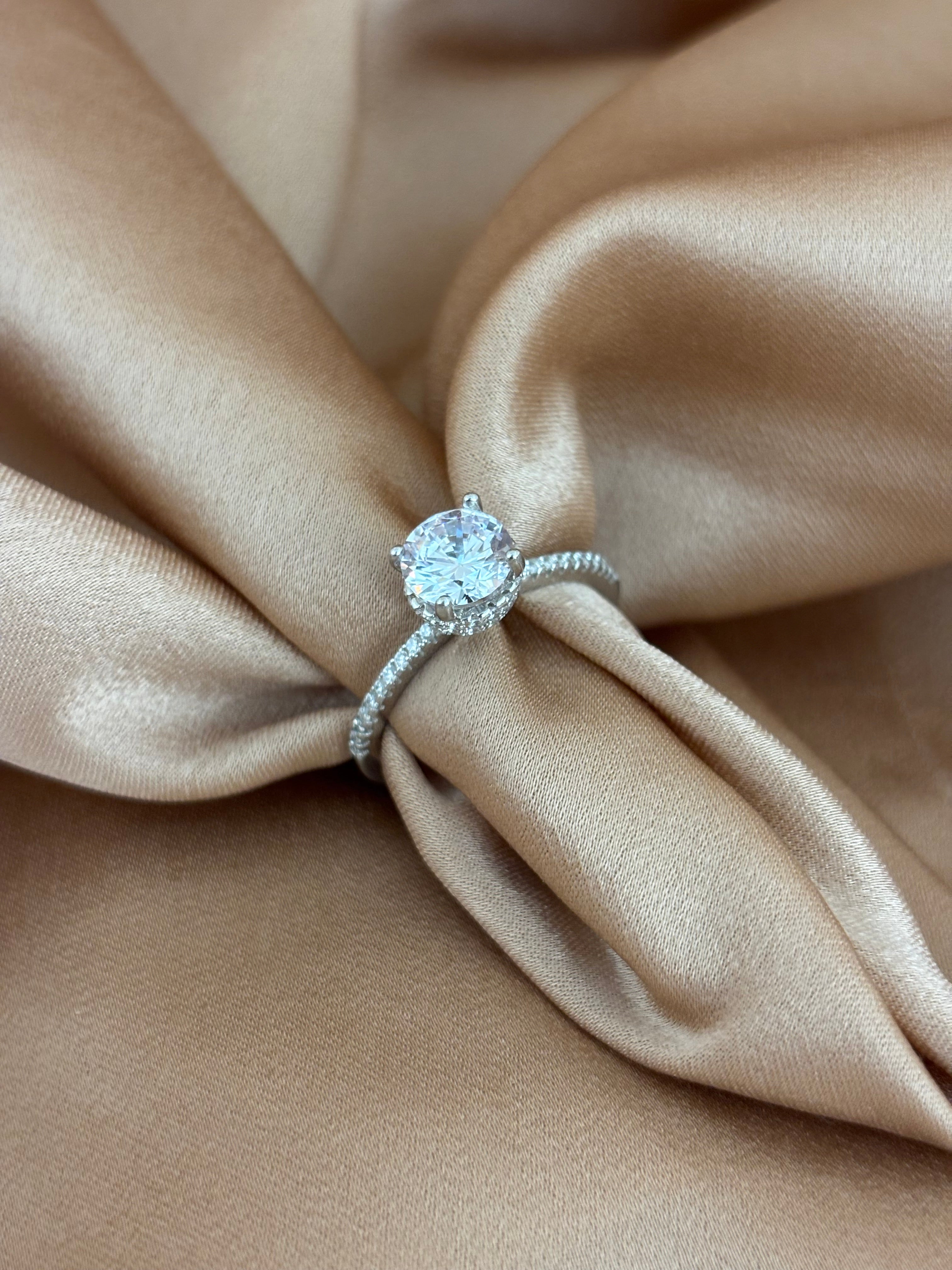 Classic Round-Cut Solitaire Ring with Hidden Halo