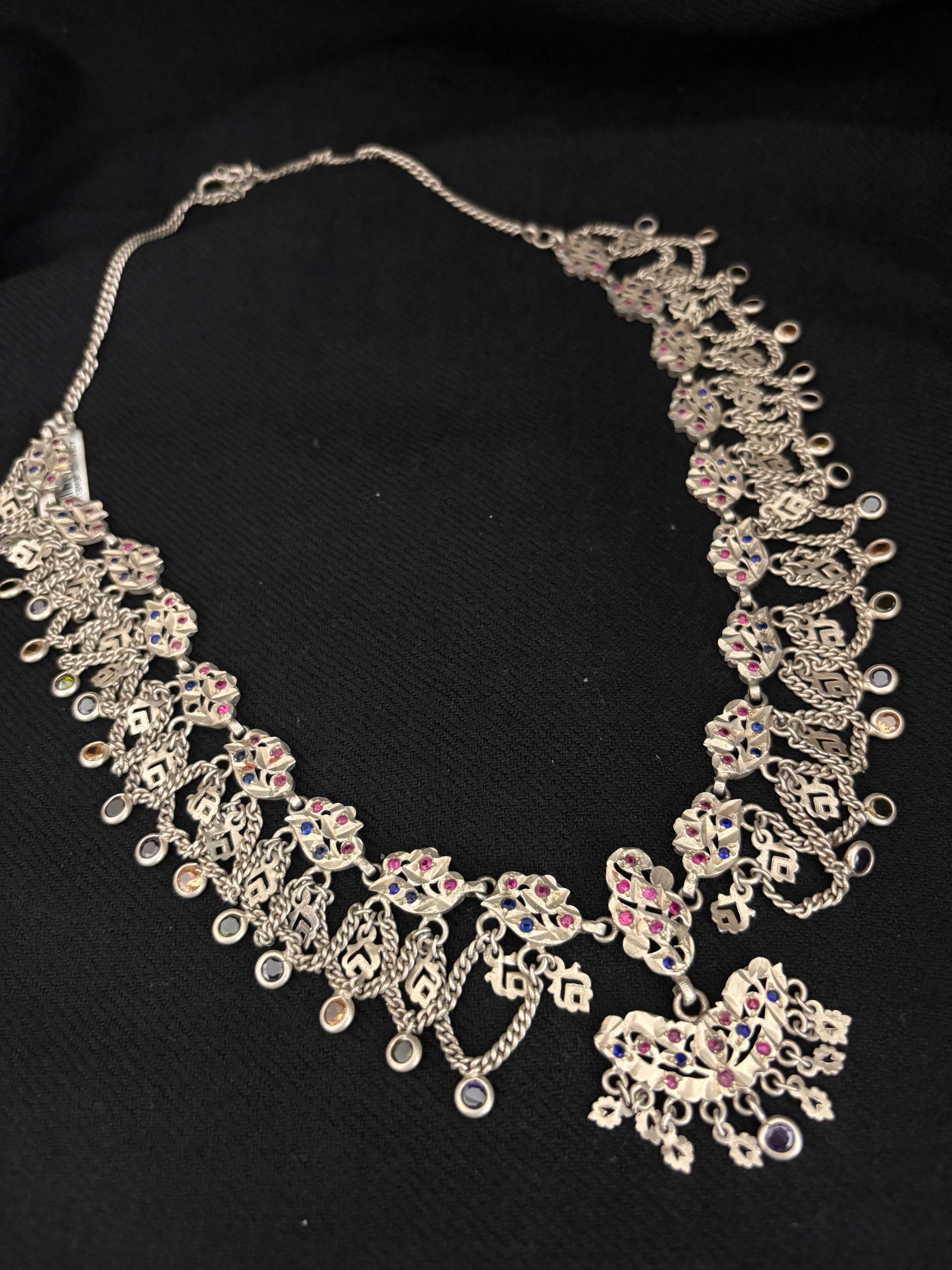 Intricate Silver Floral Necklace with Multicolored Accents