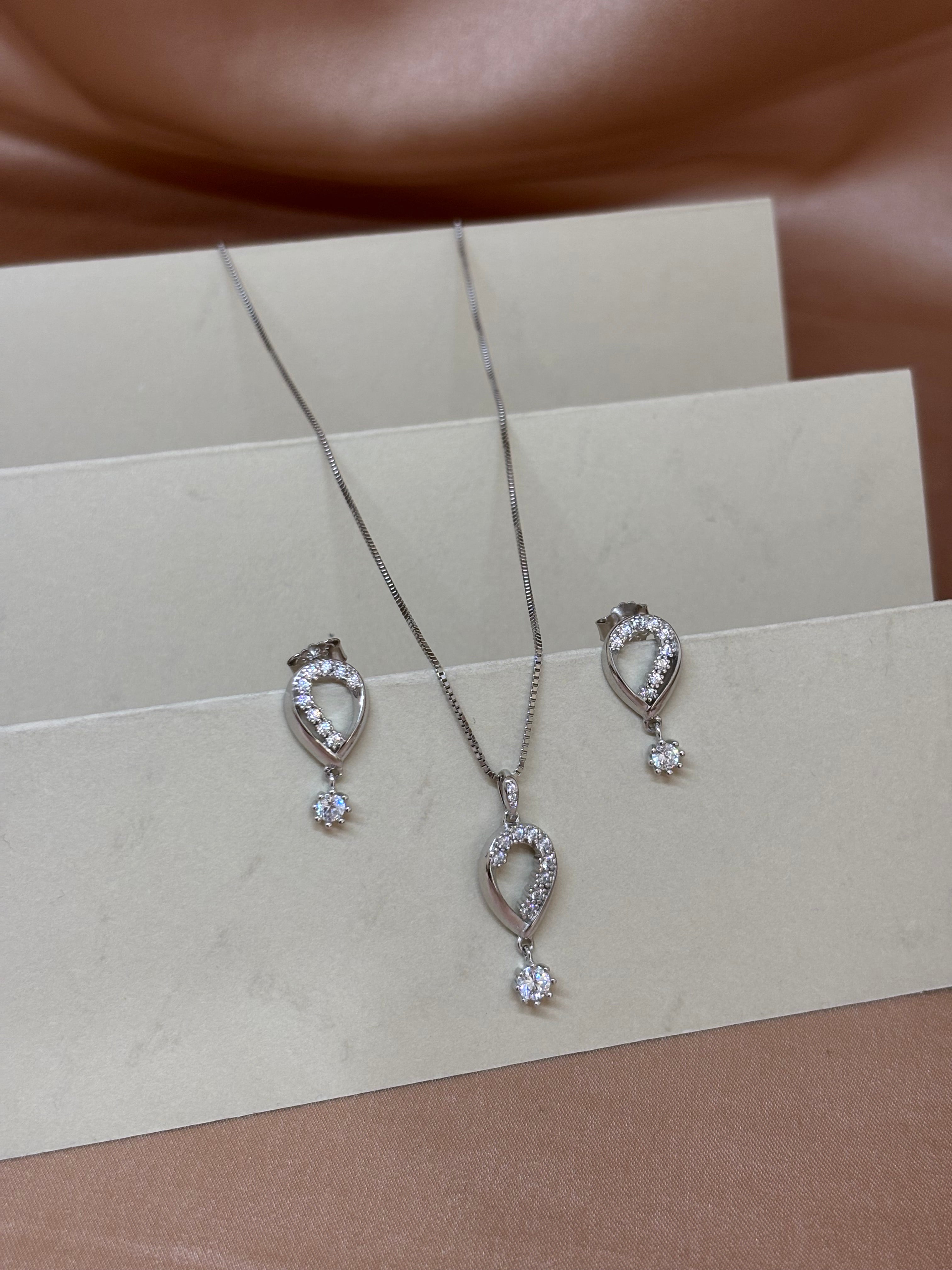 Contemporary Teardrop Crystal Pendant and Drop Earrings Set