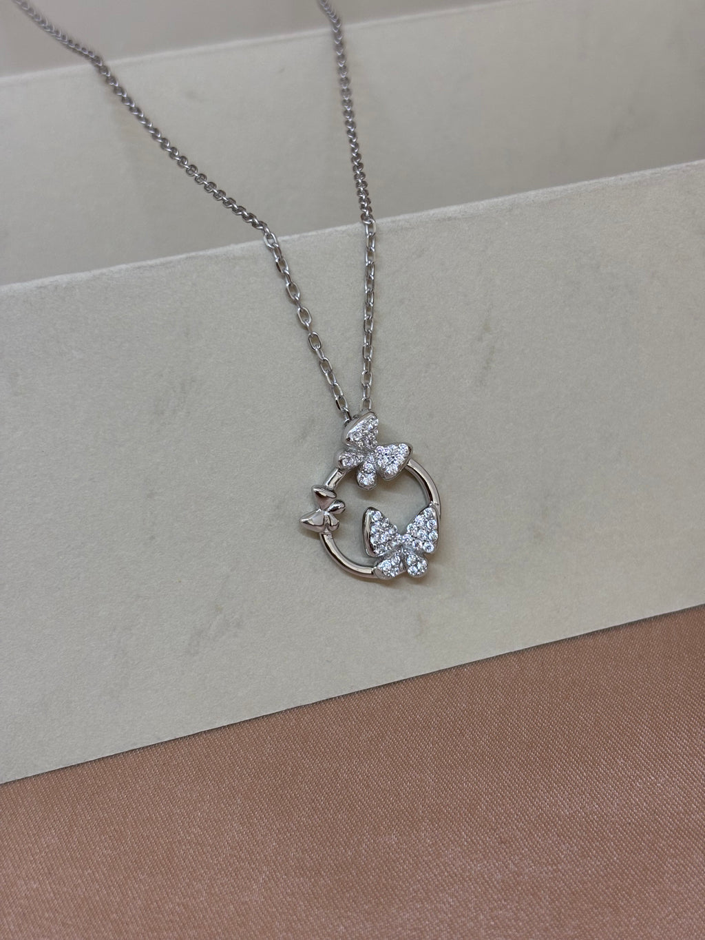 Fluttering Wings Circular Butterfly Necklace