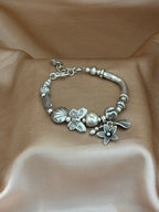 Artisan Silver Floral Charm Bracelet