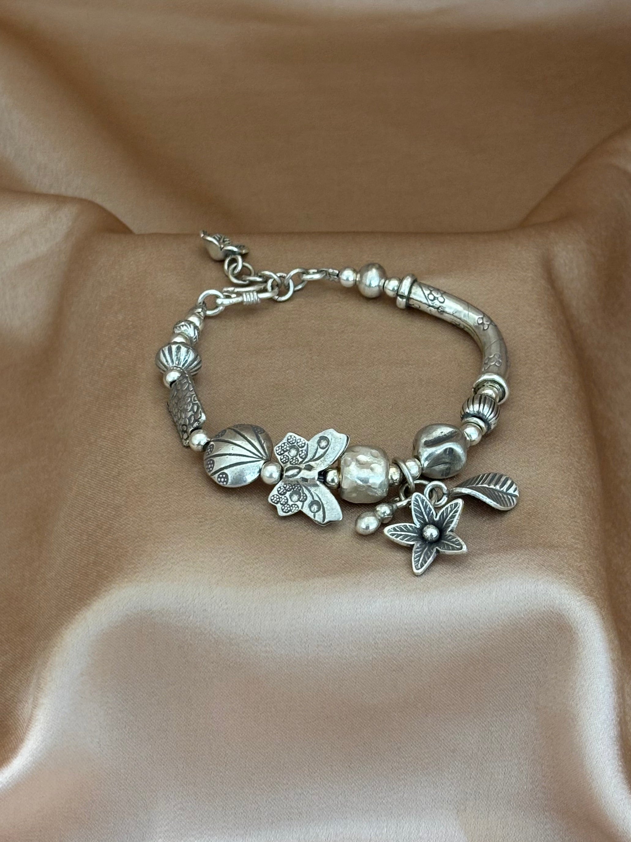 Artisan Silver Floral Charm Bracelet