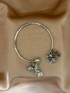 Open-Cuff with Flower and Charms