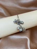 Open-Cuff with Flower and Charms