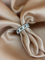 Floating Multi-Stone Eternity Band